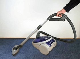 Vacuum cleaning carpet tiles and maintenance